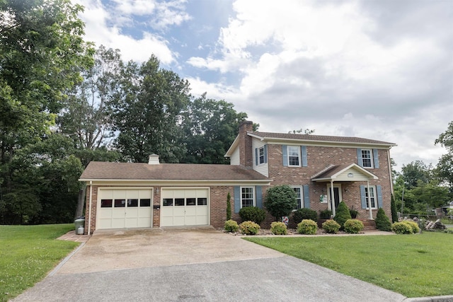 1014 22nd St E, Buena Vista, VA 24416 - colonial house with brick siding, a chimney, a garage, concrete driveway, and a front lawn