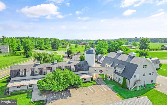  - drone / aerial view of a tree filled landscape