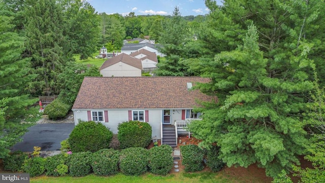  - view from above of property featuring a forest