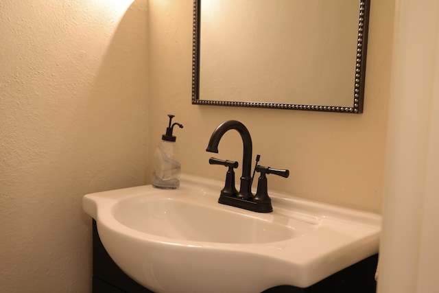 645 Cherry Ave, Waynesboro, VA 22980 - bathroom with vanity and a textured wall