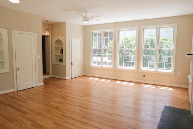 645 Cherry Ave, Waynesboro, VA 22980 - unfurnished room with a ceiling fan, healthy amount of natural light, and light wood-style flooring