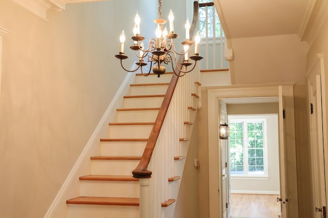 645 Cherry Ave, Waynesboro, VA 22980 - staircase featuring a chandelier and crown molding