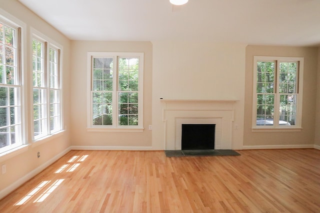 645 Cherry Ave, Waynesboro, VA 22980 - unfurnished living room featuring wood finished floors and plenty of natural light