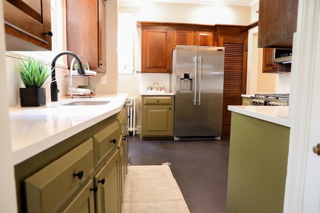 645 Cherry Ave, Waynesboro, VA 22980 - kitchen with high end refrigerator, a sink, light countertops, green cabinetry, and stove