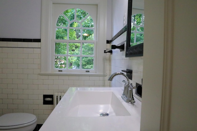 645 Cherry Ave, Waynesboro, VA 22980 - bathroom featuring tile walls, a sink, and toilet