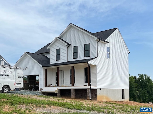 219 Riva Way, Palmyra, VA 22963 - view of front facade featuring covered porch and roof with shingles