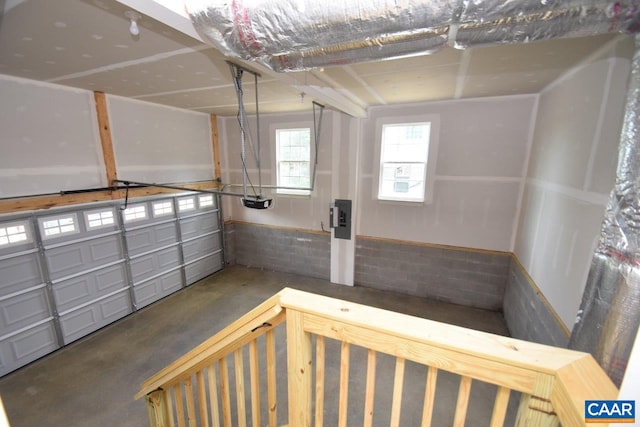 garage with a wainscoted wall