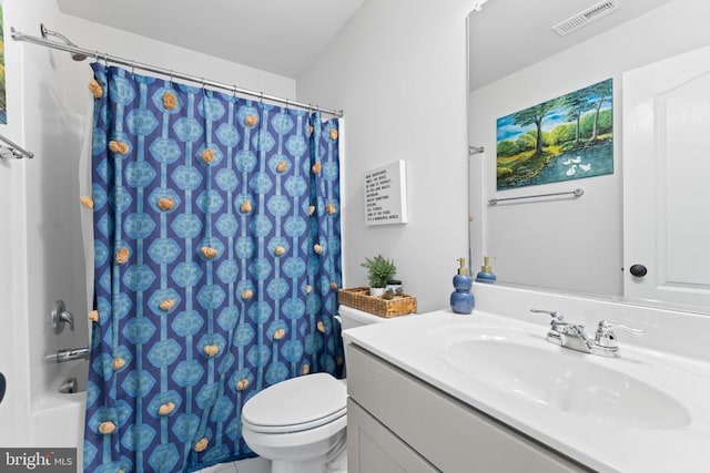 full bath featuring vanity and toilet