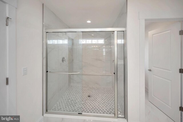  - bathroom with a marble finish shower, recessed lighting, and baseboards
