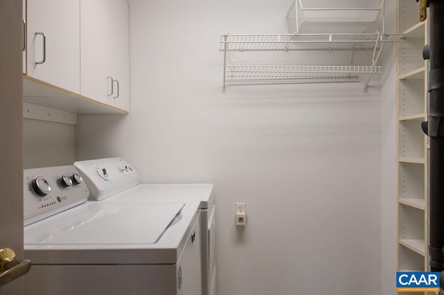 500 Crestwood Dr Unit 2203, Charlottesville, VA 22903 - laundry room featuring washing machine and clothes dryer and cabinet space