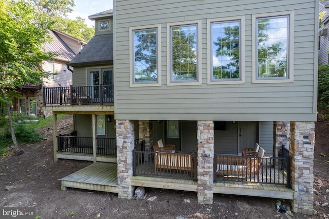93 Tyro Ln, Roseland, VA 22967 - back of house with roof with shingles and stone siding