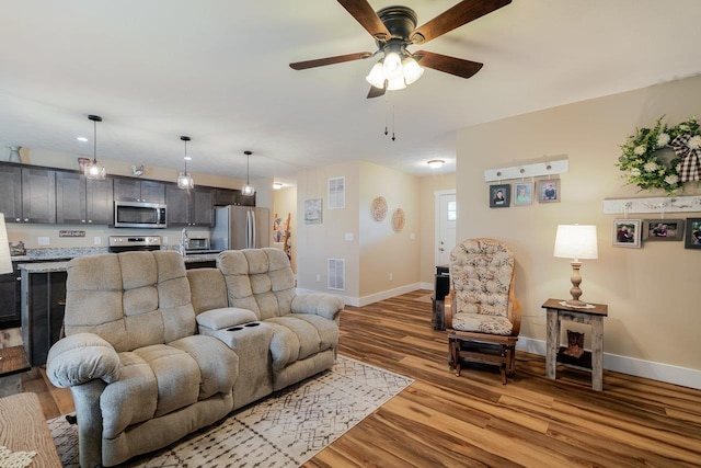375 Mesa Ct, Broadway, VA 22815 - living area with light wood finished floors and ceiling fan