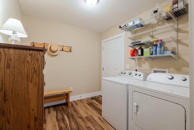 375 Mesa Ct, Broadway, VA 22815 - washroom with washer and dryer and light wood-style flooring