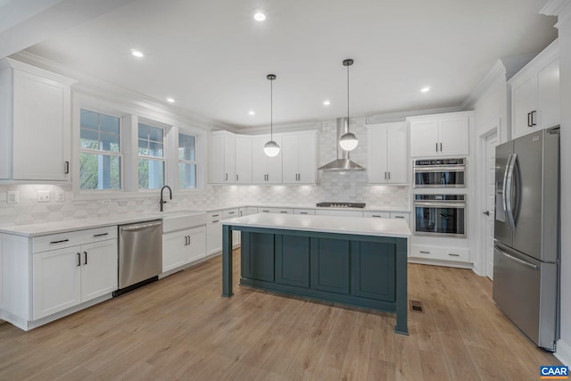 10A Sablewood Dr, Charlottesville, VA 22911 - kitchen featuring stainless steel appliances, wall chimney exhaust hood, backsplash, white cabinetry, and ornamental molding