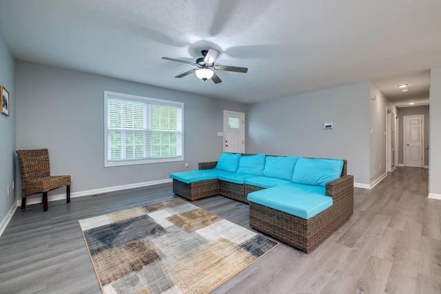 4001 Moreland Gap Rd, New Market, VA 22844 - living area featuring wood finished floors, a ceiling fan, and baseboards