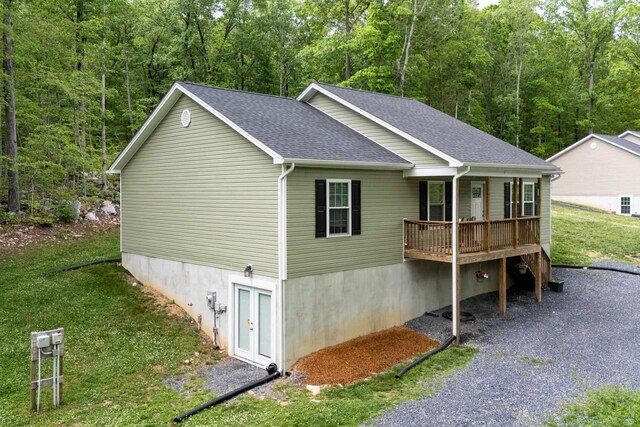 4001 Moreland Gap Rd, New Market, VA 22844 - view of front facade with roof with shingles, a front yard, and a wooded view