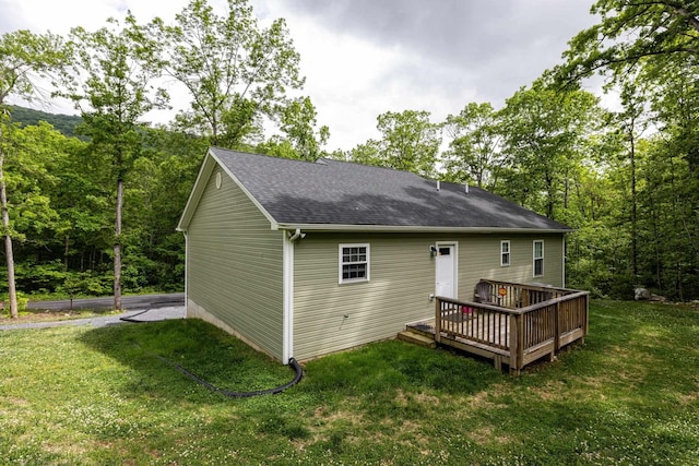 4001 Moreland Gap Rd, New Market, VA 22844 - back of property with a deck, a yard, and a shingled roof