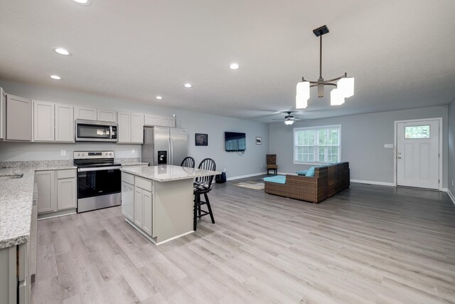 4001 Moreland Gap Rd, New Market, VA 22844 - kitchen featuring stainless steel appliances, a ceiling fan, recessed lighting, and light wood finished floors