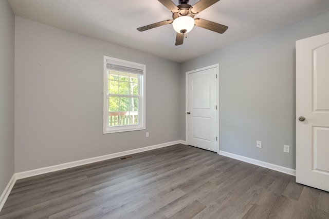 4001 Moreland Gap Rd, New Market, VA 22844 - unfurnished bedroom with dark wood-style floors, baseboards, and a ceiling fan