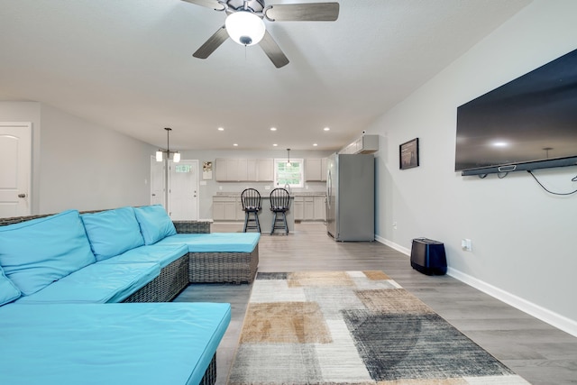 4001 Moreland Gap Rd, New Market, VA 22844 - living area with a ceiling fan, light wood finished floors, recessed lighting, and baseboards