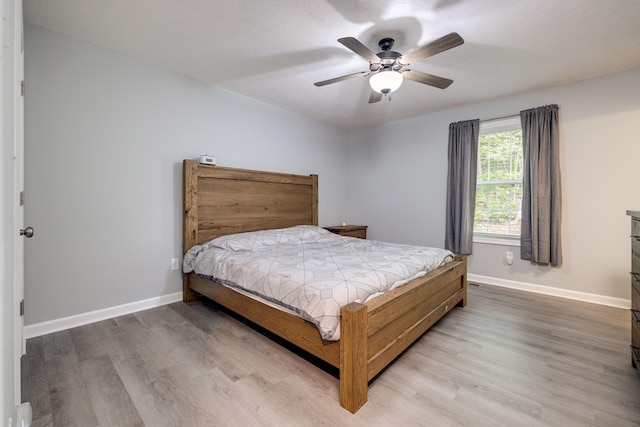 4001 Moreland Gap Rd, New Market, VA 22844 - bedroom featuring baseboards, wood finished floors, and ceiling fan