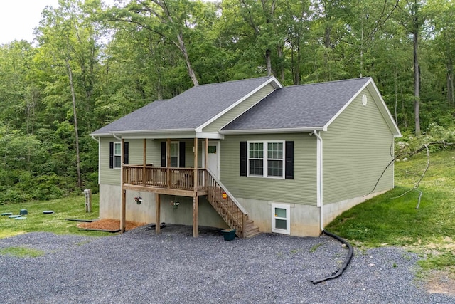 4001 Moreland Gap Rd, New Market, VA 22844 - view of front of home featuring a shingled roof, stairway, a porch, and a wooded view