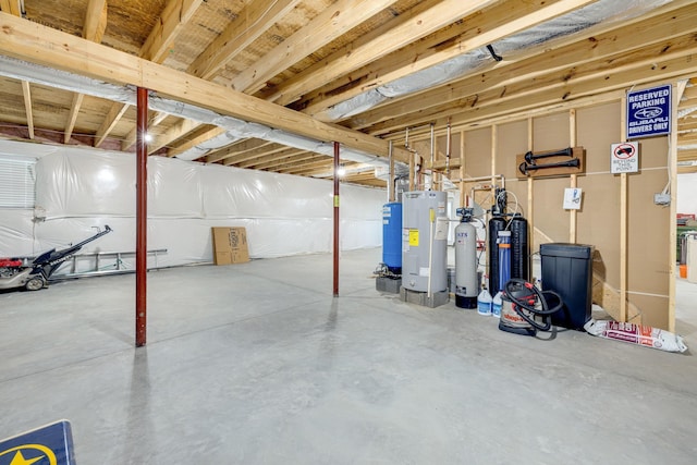 4001 Moreland Gap Rd, New Market, VA 22844 - unfinished below grade area featuring water heater, a water pressure tank, and a water softener system