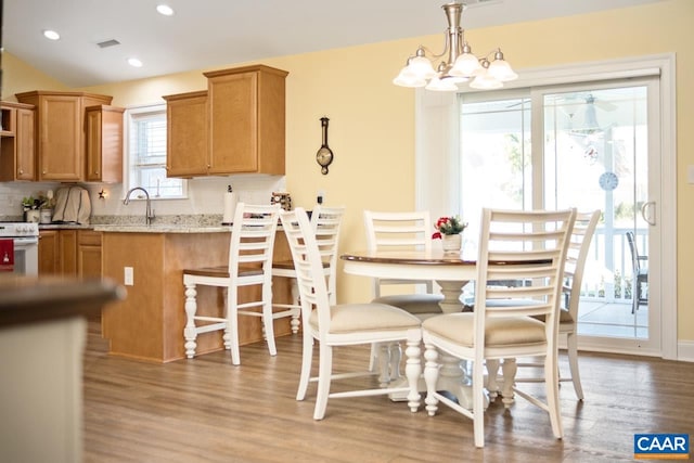 10 Apple Blossom Ct, Nellysford, VA 22958 - dining space featuring recessed lighting, an inviting chandelier, visible vents, and wood finished floors