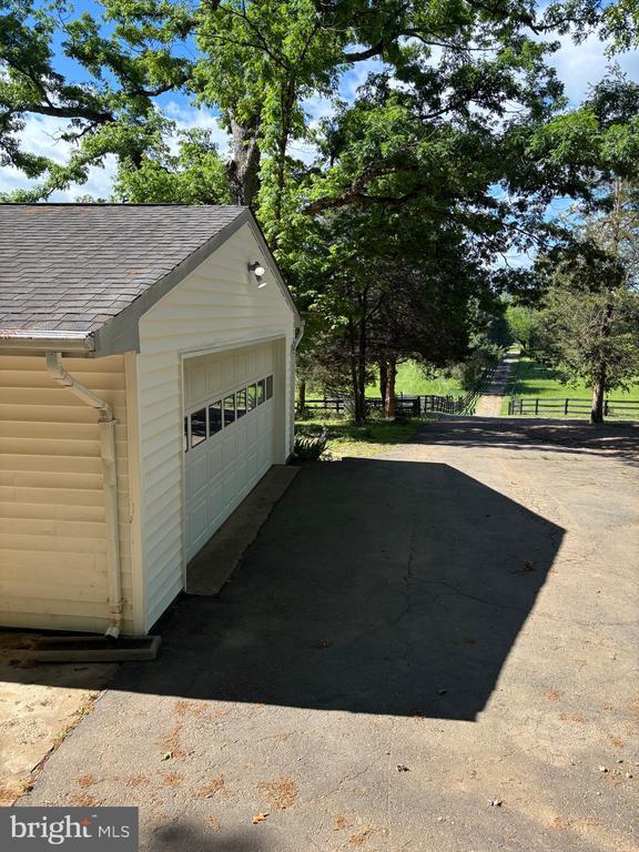  - detached garage with fence