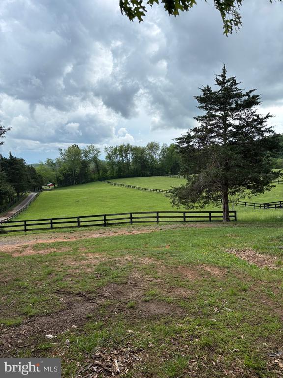  - view of yard with a view of rural / pastoral area