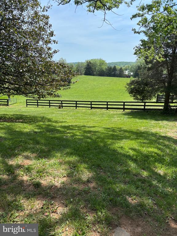  - view of yard with a view of rural / pastoral area