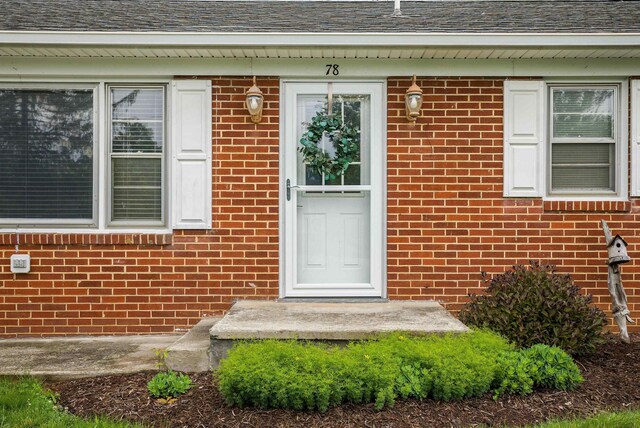 78 Stuart Ave, Stuarts Draft, VA 24477 - doorway to property featuring brick siding and a shingled roof