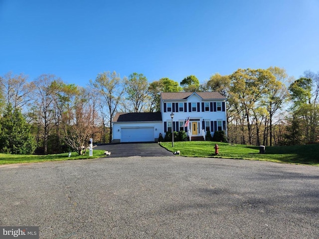 10010 Peppermill Ct, Fredericksburg, VA 22407 - colonial inspired home featuring driveway, a front lawn, and an attached garage