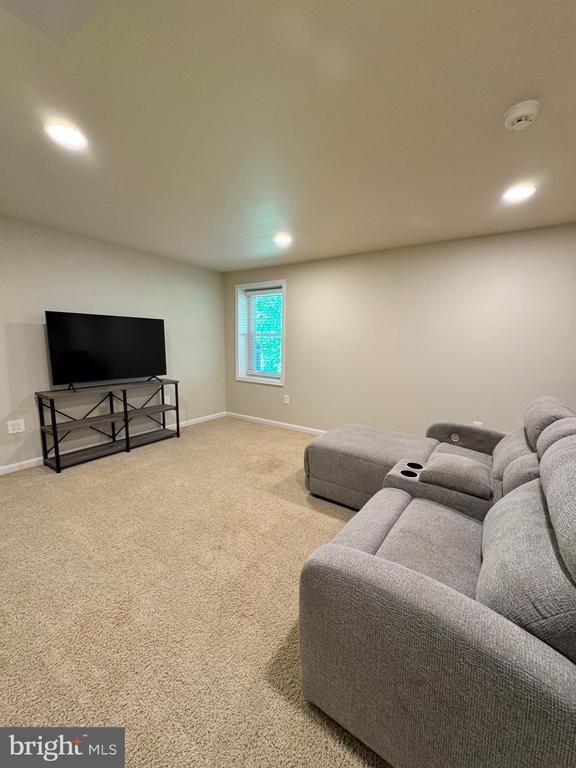 10010 Peppermill Ct, Fredericksburg, VA 22407 - living room featuring baseboards, recessed lighting, and carpet floors