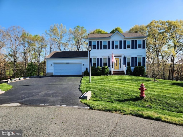10010 Peppermill Ct, Fredericksburg, VA 22407 - colonial house with an attached garage, driveway, and a front lawn