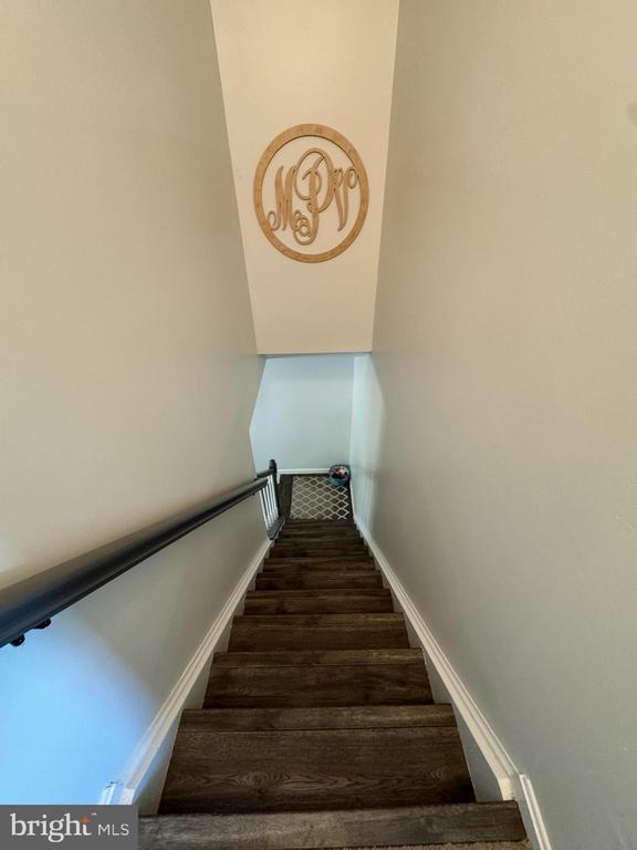 10010 Peppermill Ct, Fredericksburg, VA 22407 - stairs with wood finished floors and baseboards