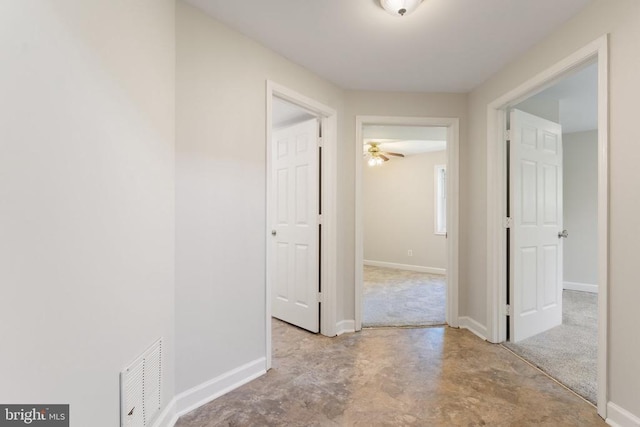  - corridor featuring baseboards