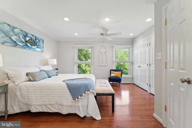  - bedroom with wood finished floors, ornamental molding, recessed lighting, and ceiling fan