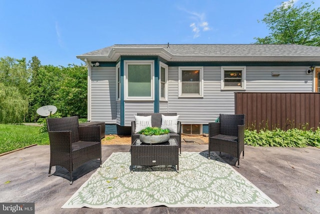  - view of patio featuring an outdoor living space