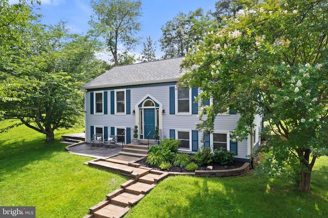  - split foyer home featuring a front yard