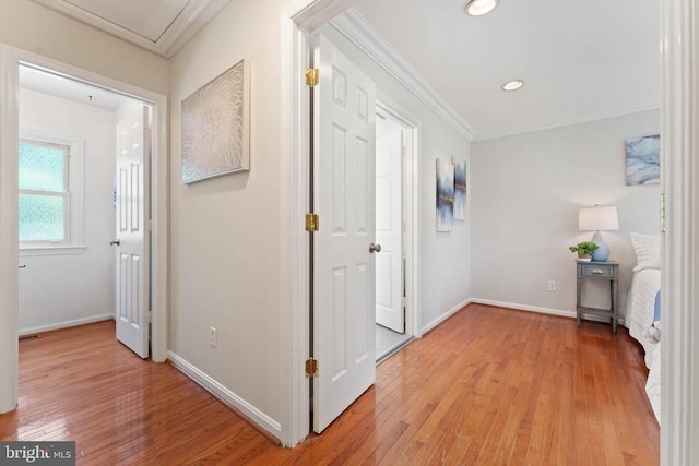  - hallway featuring crown molding, light wood finished floors, and recessed lighting