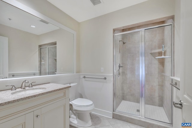 full bath featuring tile patterned floors, toilet, visible vents, and a stall shower