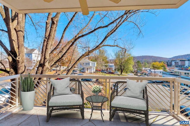 balcony featuring a mountain view