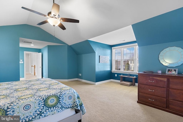 bedroom with carpet flooring, vaulted ceiling, baseboards, and a ceiling fan