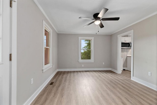 837 Faber Ave, Waynesboro, VA 22980 - unfurnished bedroom with light wood-type flooring, baseboards, ornamental molding, ensuite bathroom, and a ceiling fan