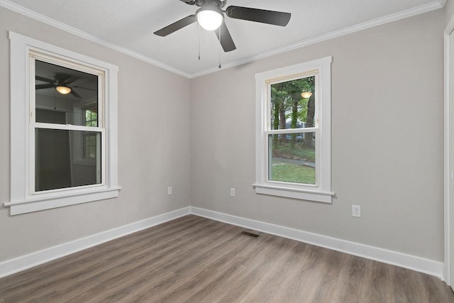 837 Faber Ave, Waynesboro, VA 22980 - empty room featuring wood finished floors, baseboards, ceiling fan, and crown molding