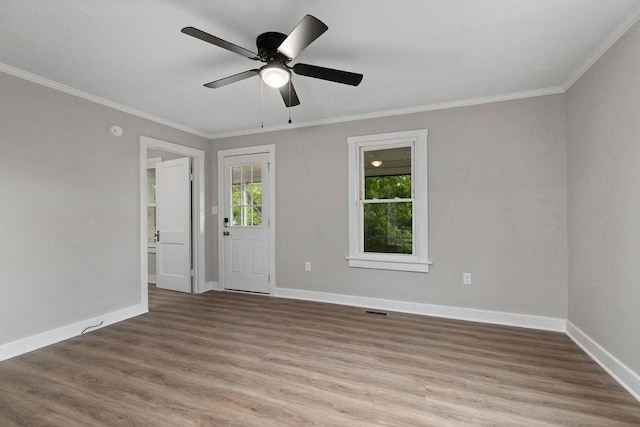 837 Faber Ave, Waynesboro, VA 22980 - unfurnished room featuring ornamental molding, baseboards, wood finished floors, and a ceiling fan