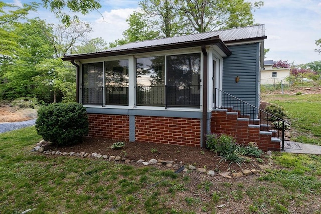 837 Faber Ave, Waynesboro, VA 22980 - view of property exterior featuring a sunroom, metal roof, and a yard