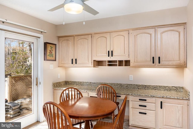 dining space featuring a ceiling fan