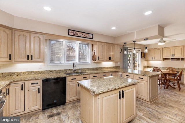 kitchen featuring a sink, light brown cabinetry, dishwasher, a kitchen island, and recessed lighting